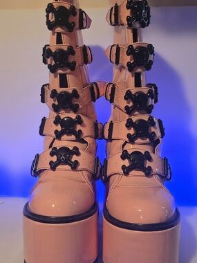 Platform Knee-High Buckle Boots in Pink with Skull Accents